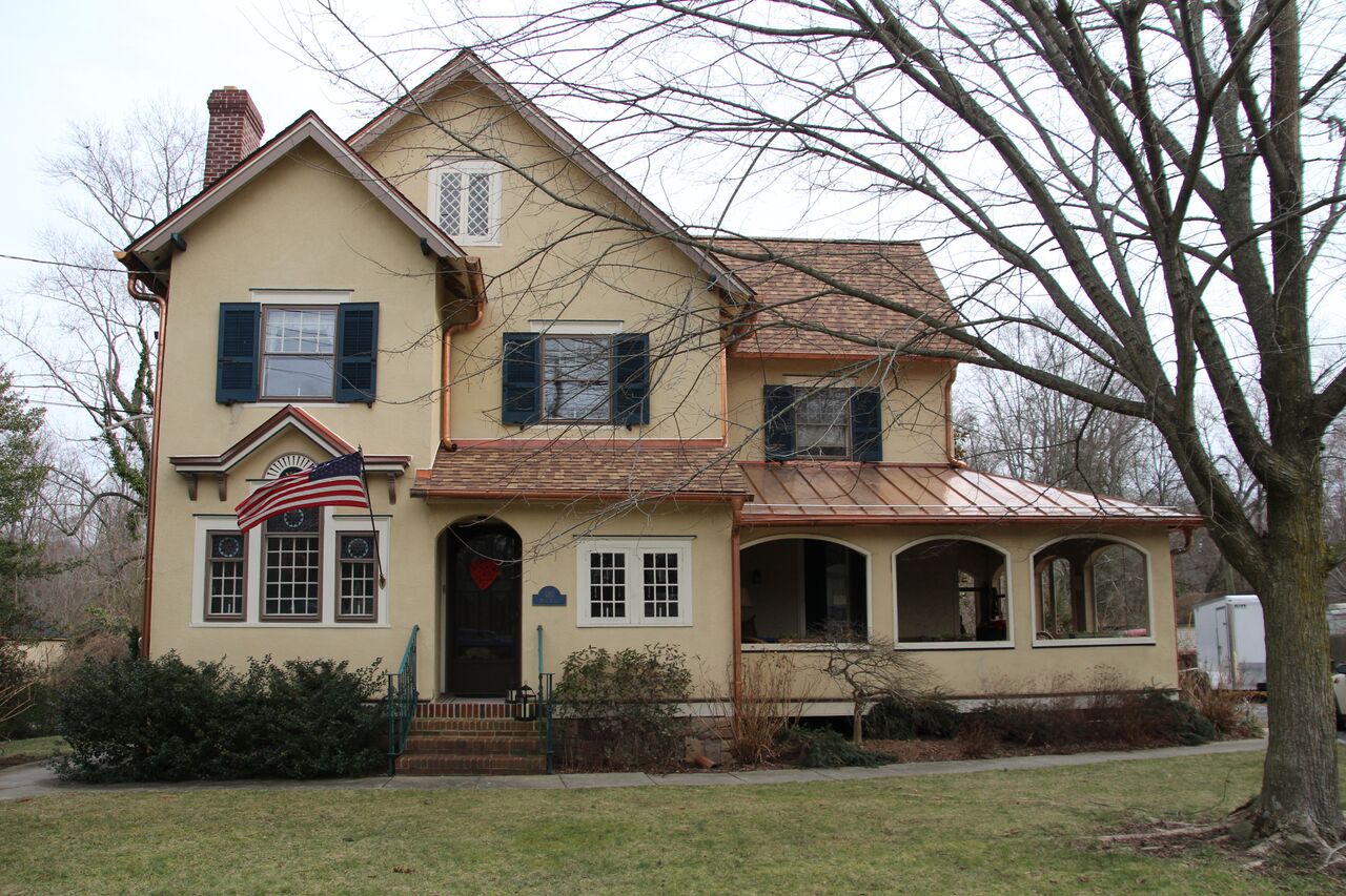 Historical roof restoration with LandMark Pro Shingles and copper standing seamed roof